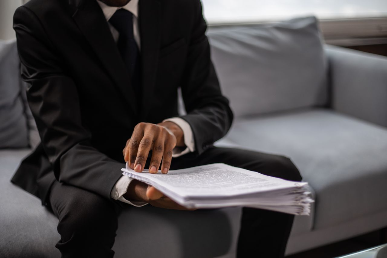 Financial advisor explaining debt relief options during a free debt assessment